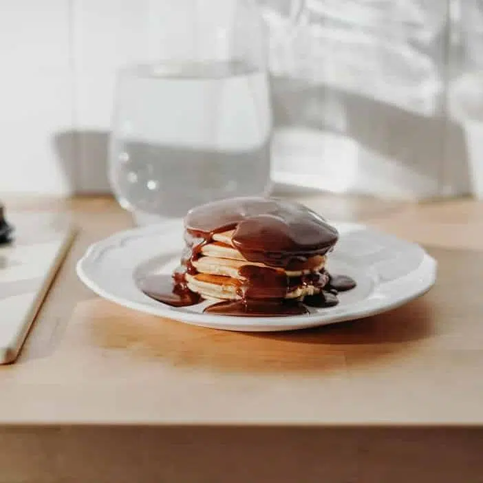 Photo Of Chocolate Pancakes On A Ceramic Plate